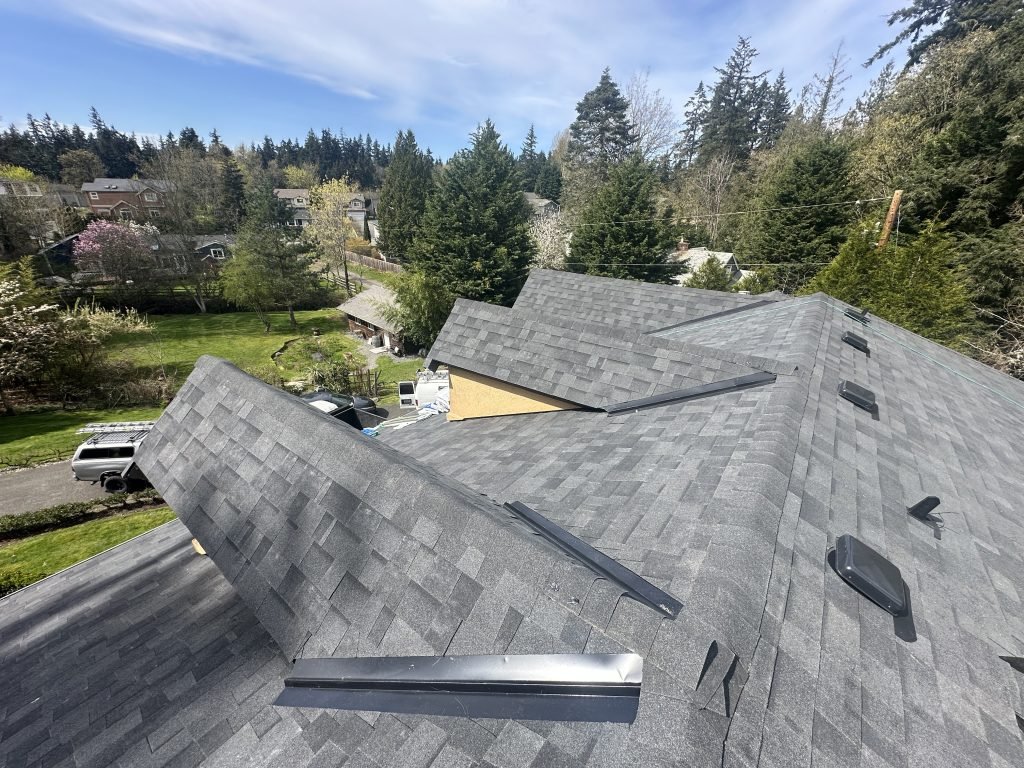 Clear sunny day over modern home’s rooftop