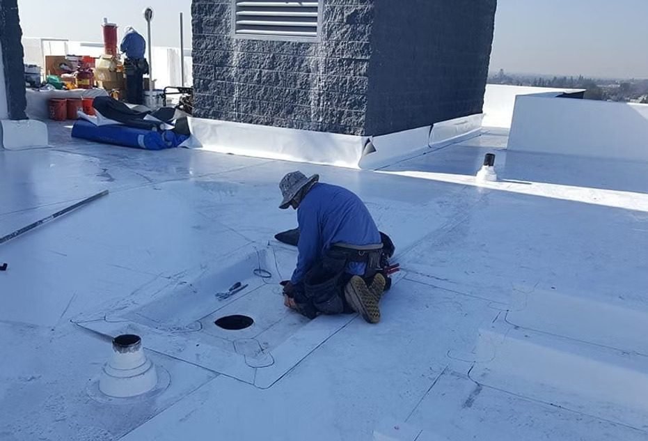 Expert TPO roof installation for commercial flat roofing systems