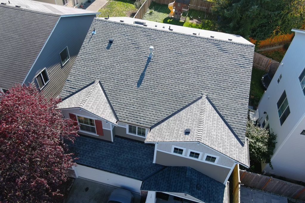 Aerial view of gray shingle roof on modern home