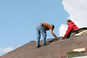 Roofers at work