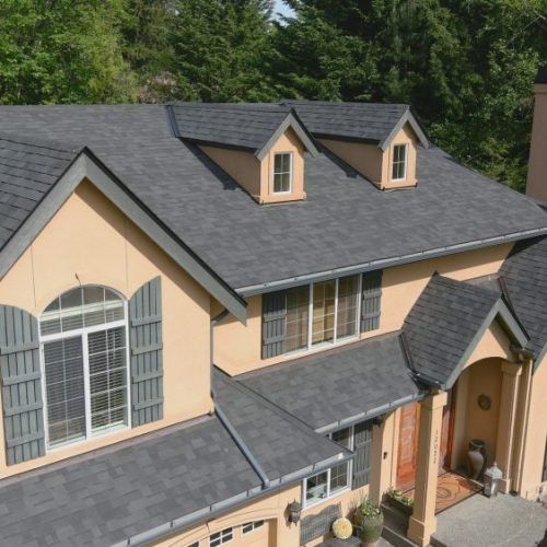 Modern two-story home with newly installed architectural asphalt shingle roofing