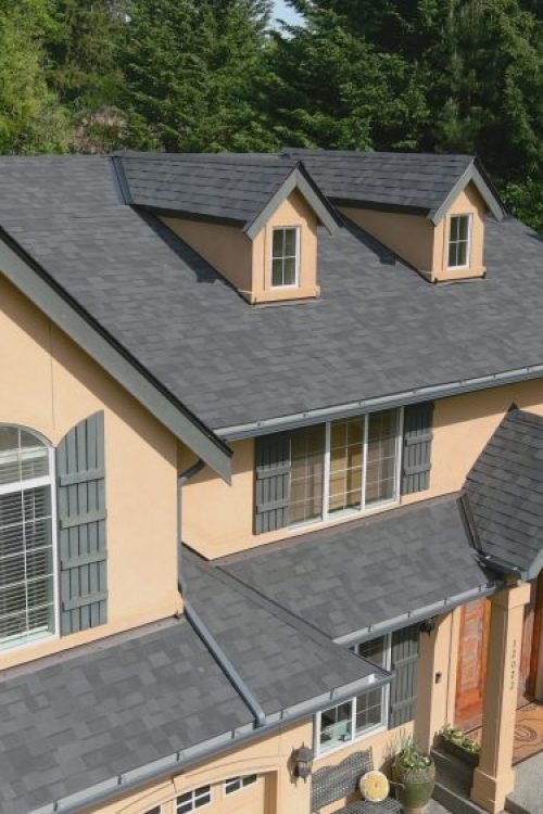 Modern two-story home with newly installed architectural asphalt shingle roofing