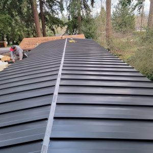 Standing seam metal roof installation
