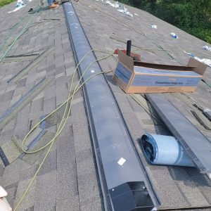 Ridge vent installation on shingle roof